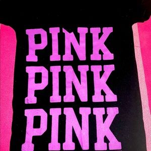 Pink brand t-shirt with logo printed three times on the front. Size is XS